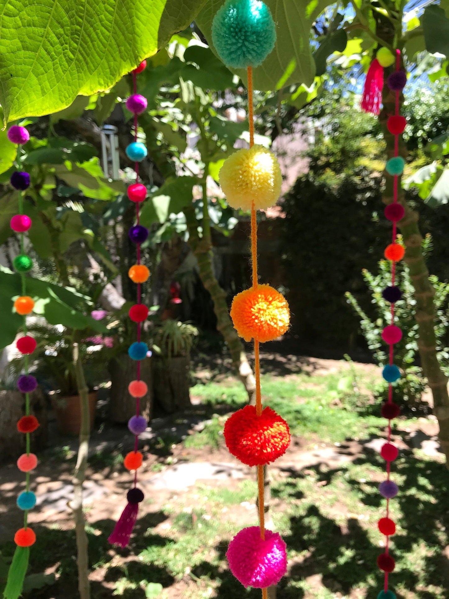 handmade Mexican pom pom string garland close up