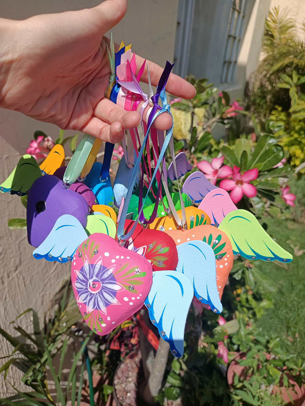 mexican winged heart ornaments in 10 different colours