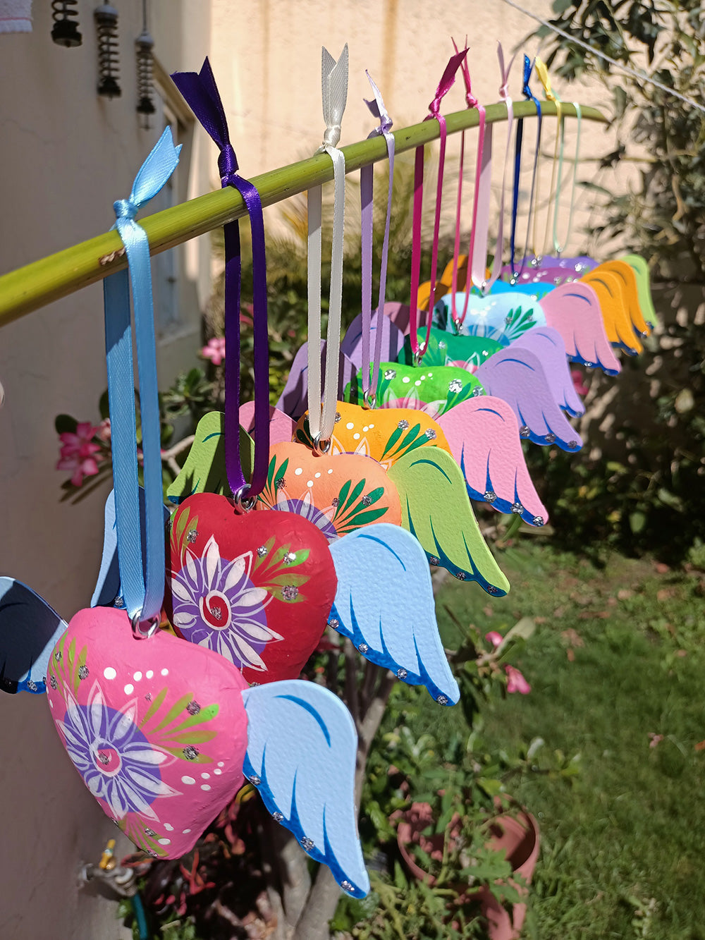 winged heart ornament with satin ribbon loop to hang